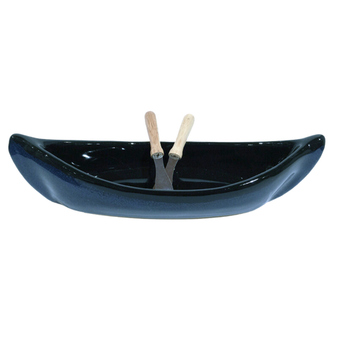 Blue ad black canoe with two spatulas as paddles.