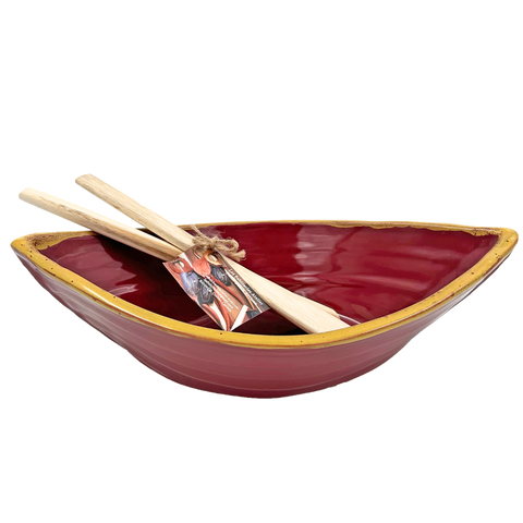 Red and gold dory serving board with two paddle servers.